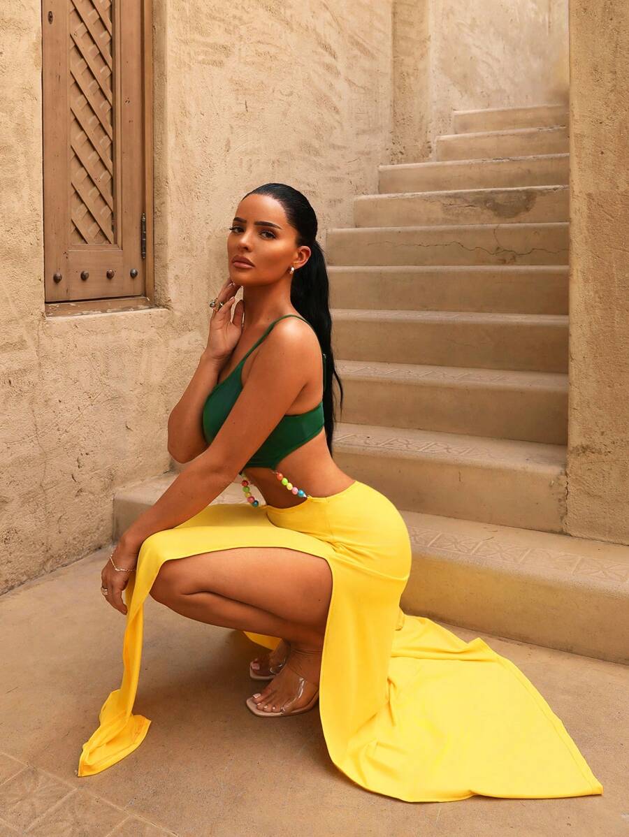 بودي سوت نسائي من INAWLY بدون أكمام بلون سادة وتصميم مجمّع ضيّق