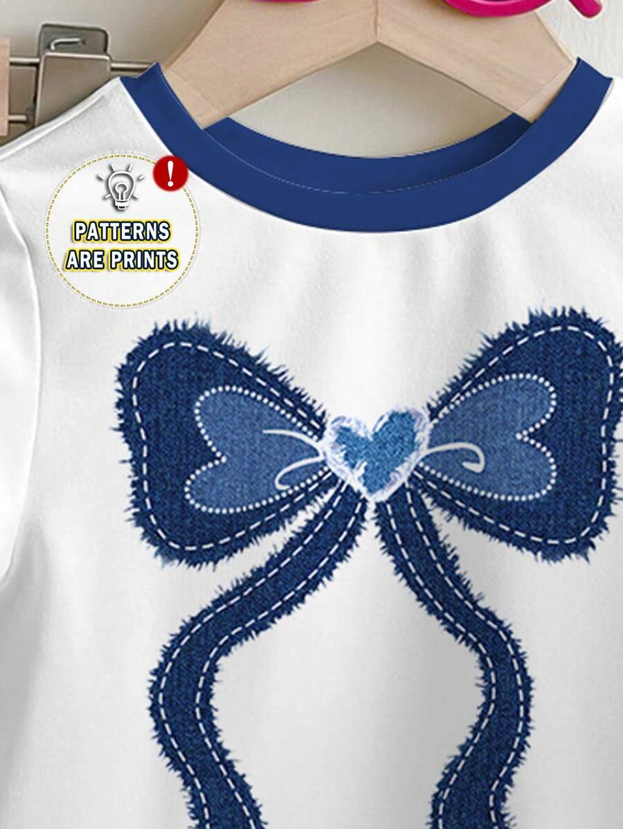 مجموعة من قطعتين من بلوزة وبنطلون واسع بأكمام قصيرة ورقبة دائرية وطبعة فراشات من SHEIN