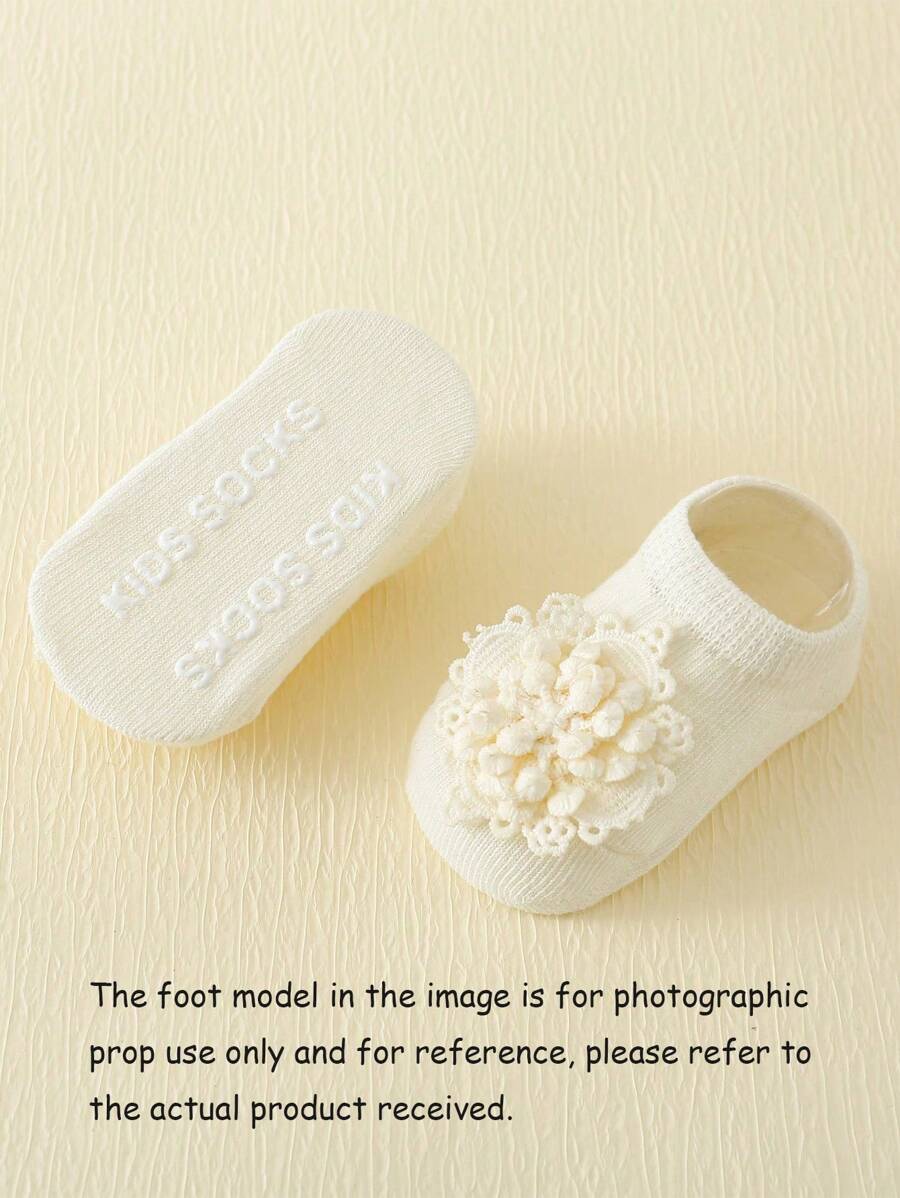 طقم شرابات أطفال بيضاء مضادة للانزلاق مع تطريز زهري + ربطة رأس للرضّع