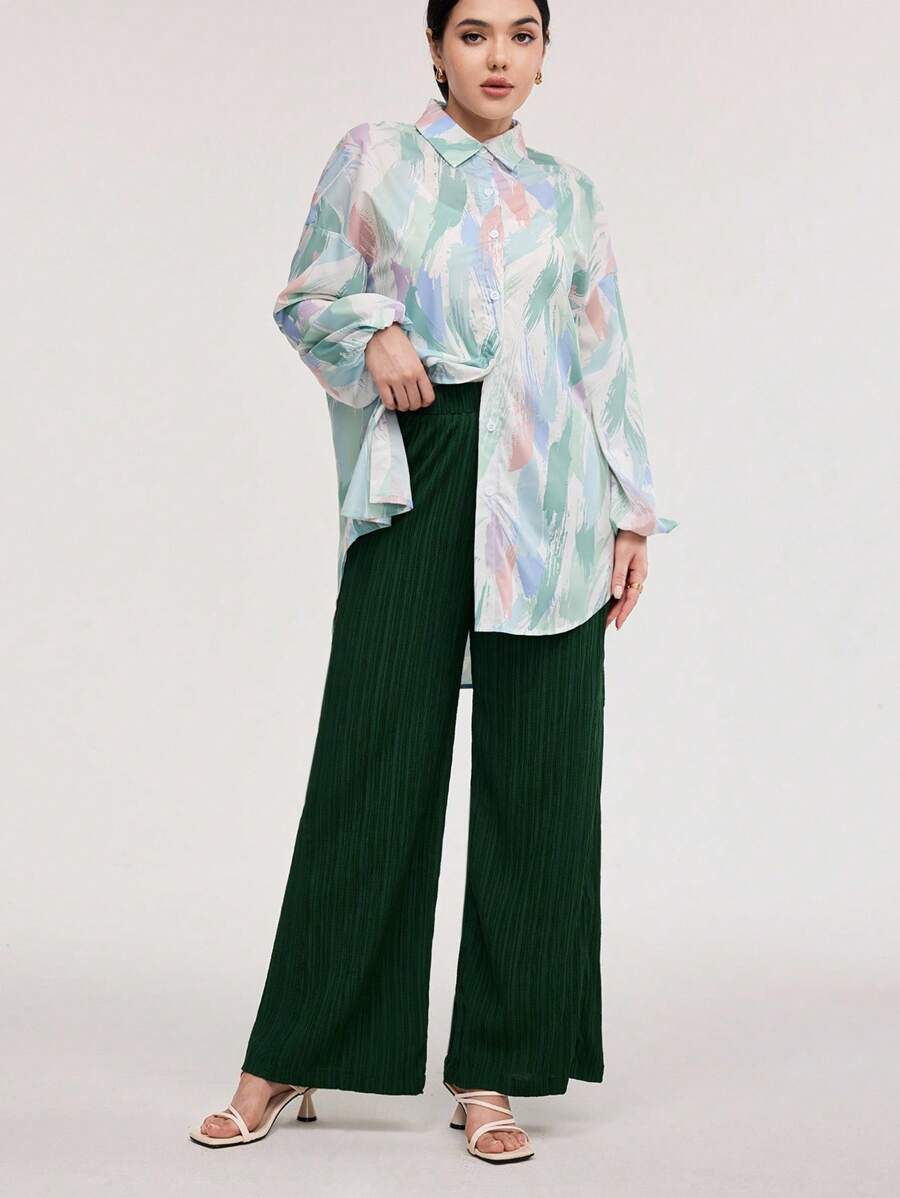 طقم من قطعتين من Veilorie نسائي مكون من بلوزة بأكمام فانوس مطبوعة وبنطلون واسع بلون سادة