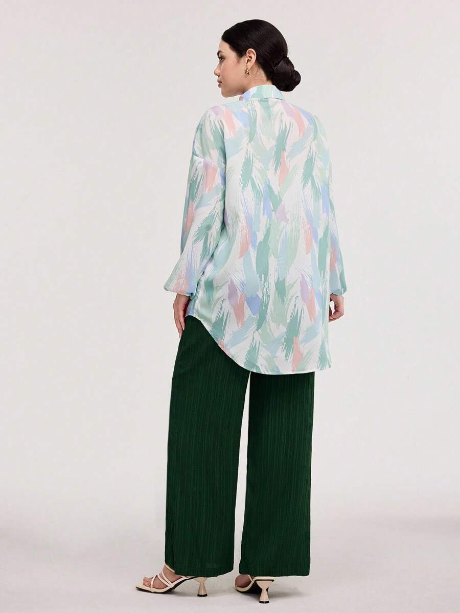 طقم من قطعتين من Veilorie نسائي مكون من بلوزة بأكمام فانوس مطبوعة وبنطلون واسع بلون سادة