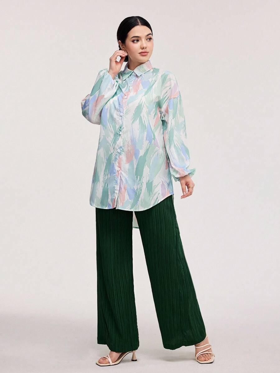 طقم من قطعتين من Veilorie نسائي مكون من بلوزة بأكمام فانوس مطبوعة وبنطلون واسع بلون سادة