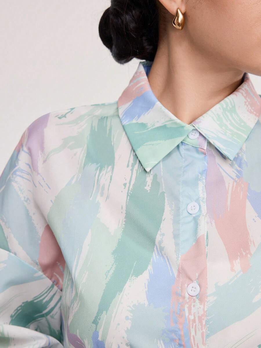 طقم من قطعتين من Veilorie نسائي مكون من بلوزة بأكمام فانوس مطبوعة وبنطلون واسع بلون سادة