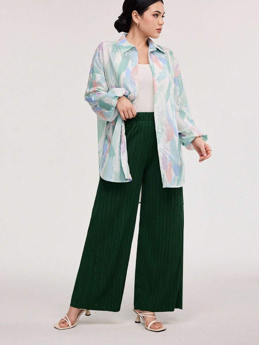 طقم من قطعتين من Veilorie نسائي مكون من بلوزة بأكمام فانوس مطبوعة وبنطلون واسع بلون سادة