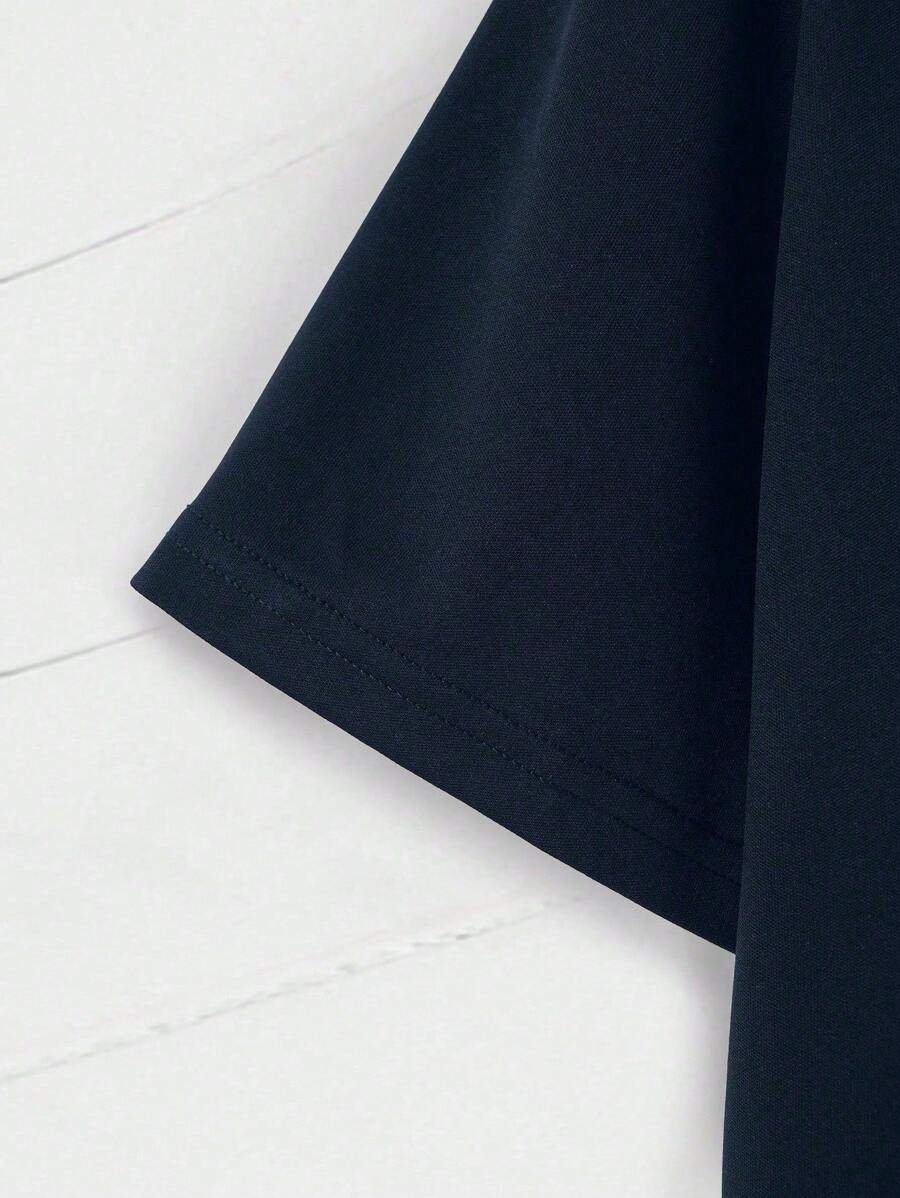 تي شيرت جرافيكي بشعار INAWLY Plus من Shein