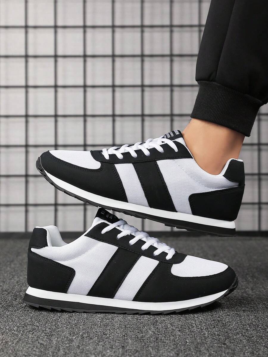 حذاء رياضي رجالي باللونين الأبيض والأسود من Shein