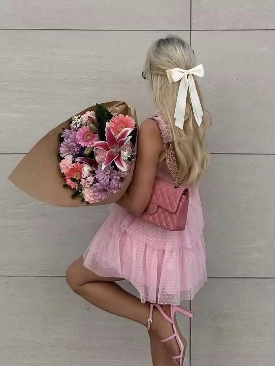 توكه شعر على شكل فيونكة ساتان بلون كريمي أنيق