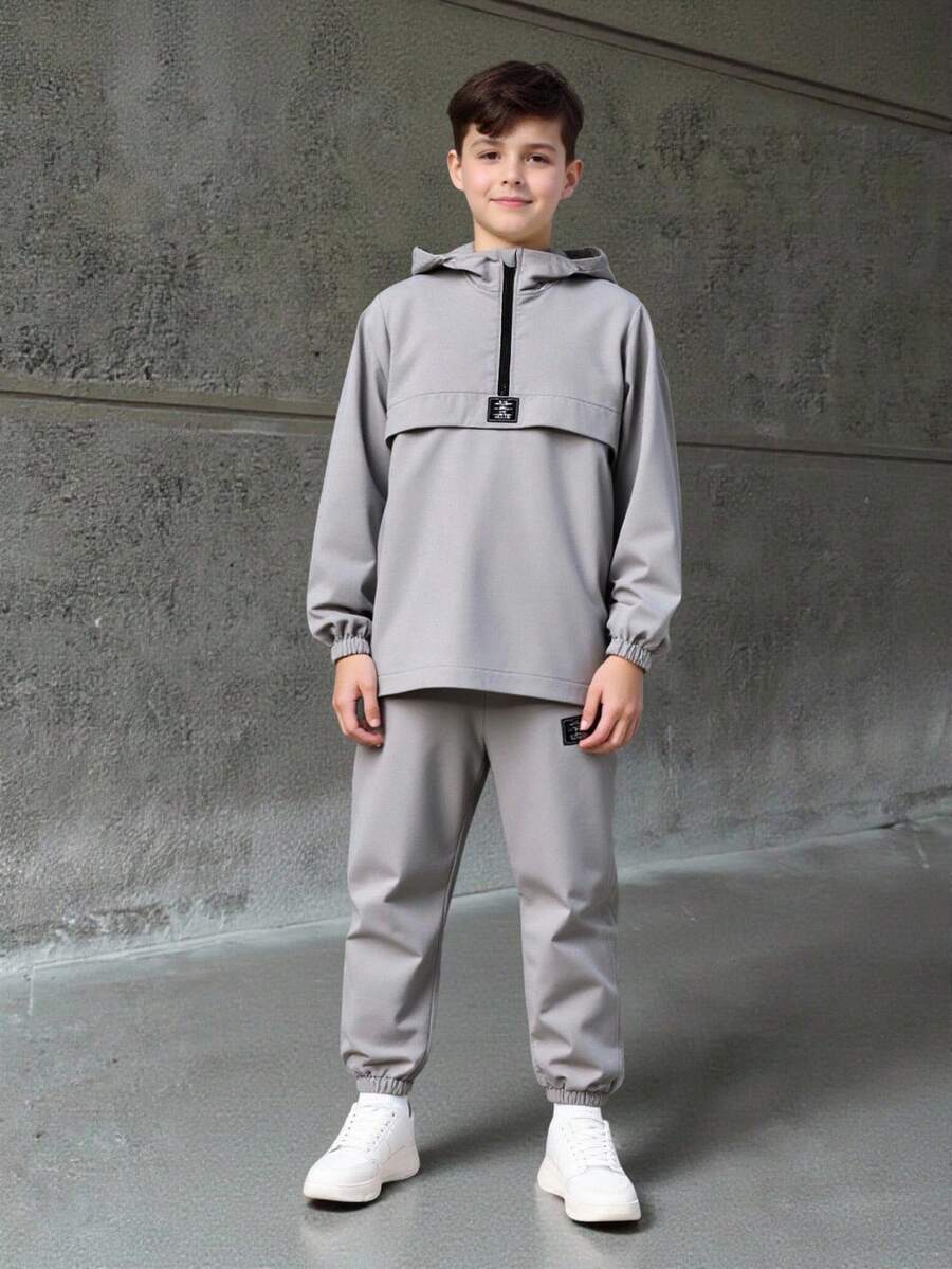 طقم شي ان للأولاد من قطعتين - جاكيت بغطاء رأس وسحاب وبنطال برباط، بتصميم رياضي كاجوال مناسب للخريف/الشتاء