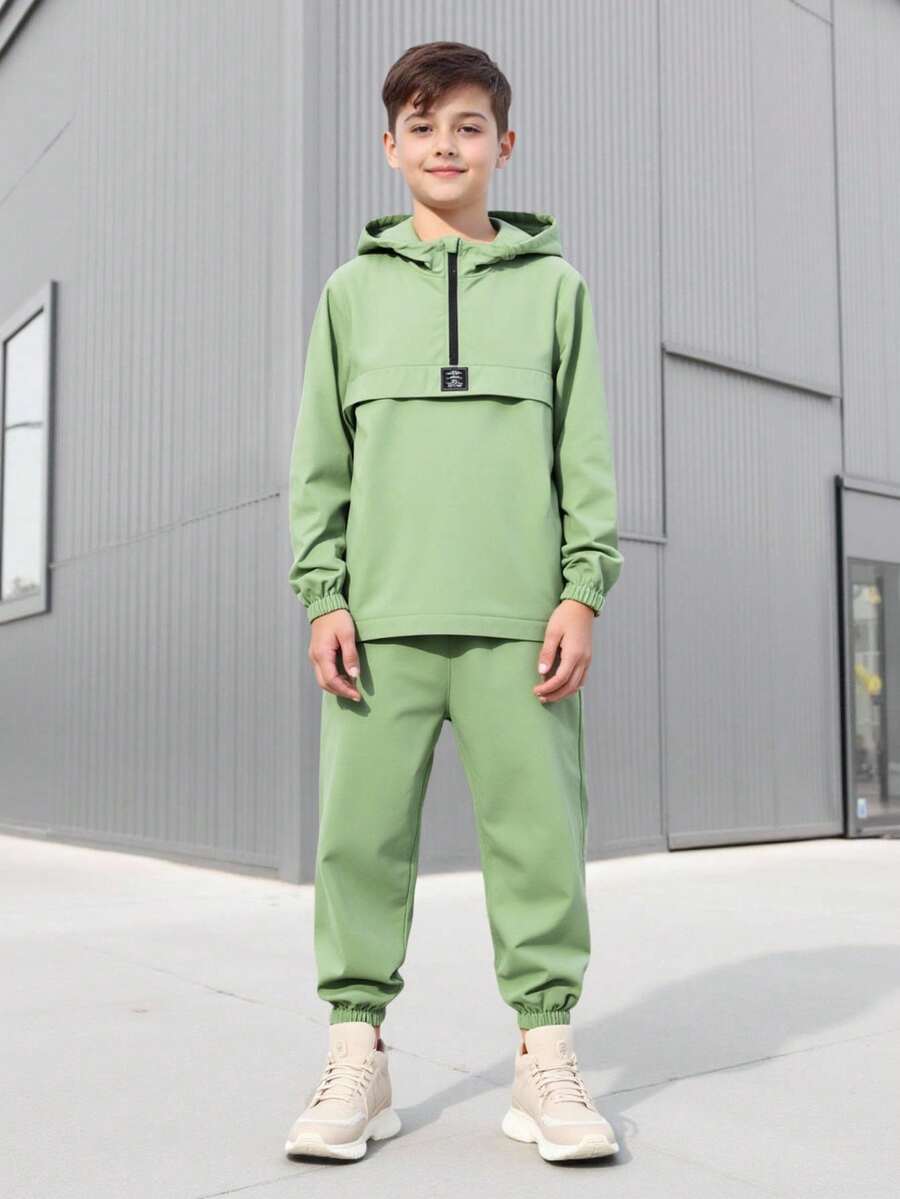 طقم شي ان للأولاد من قطعتين - جاكيت بغطاء رأس وسحاب وبنطال برباط، بتصميم رياضي كاجوال مناسب للخريف/الشتاء