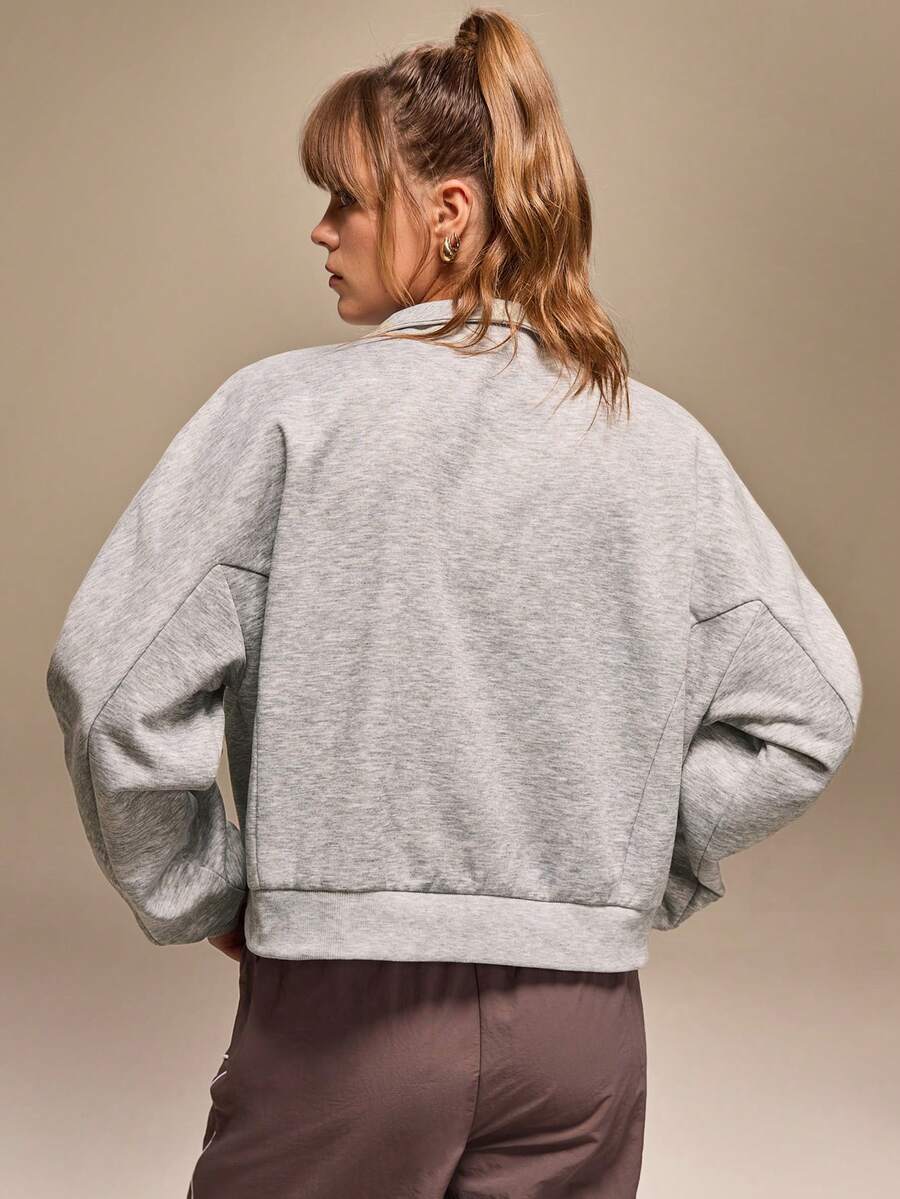 سويت شيرت فضفاض بأكمام طويلة وياقة واقفة وسحاب نصفي من Hanevo للنساء بتصميم أمريكي كاجوال