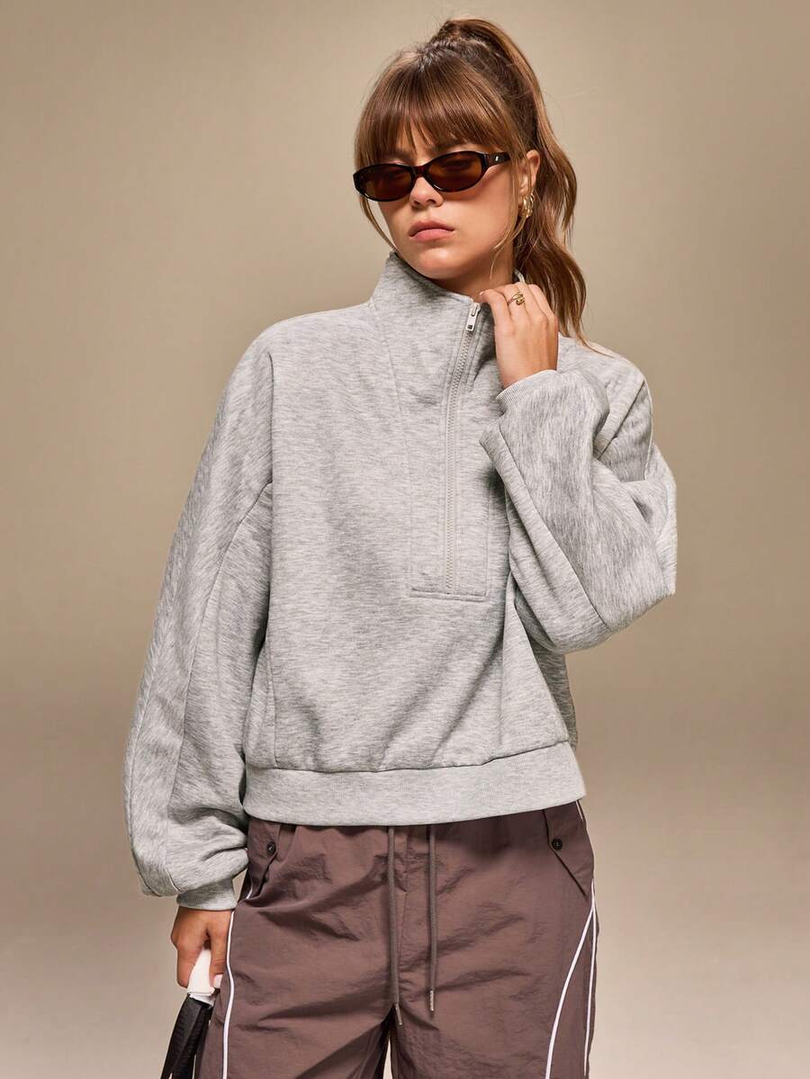 سويت شيرت فضفاض بأكمام طويلة وياقة واقفة وسحاب نصفي من Hanevo للنساء بتصميم أمريكي كاجوال