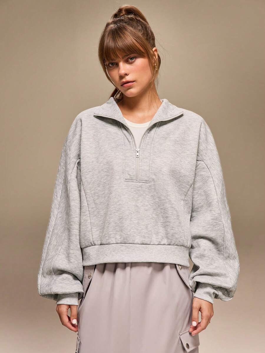 سويت شيرت فضفاض بأكمام طويلة وياقة واقفة وسحاب نصفي من Hanevo للنساء بتصميم أمريكي كاجوال