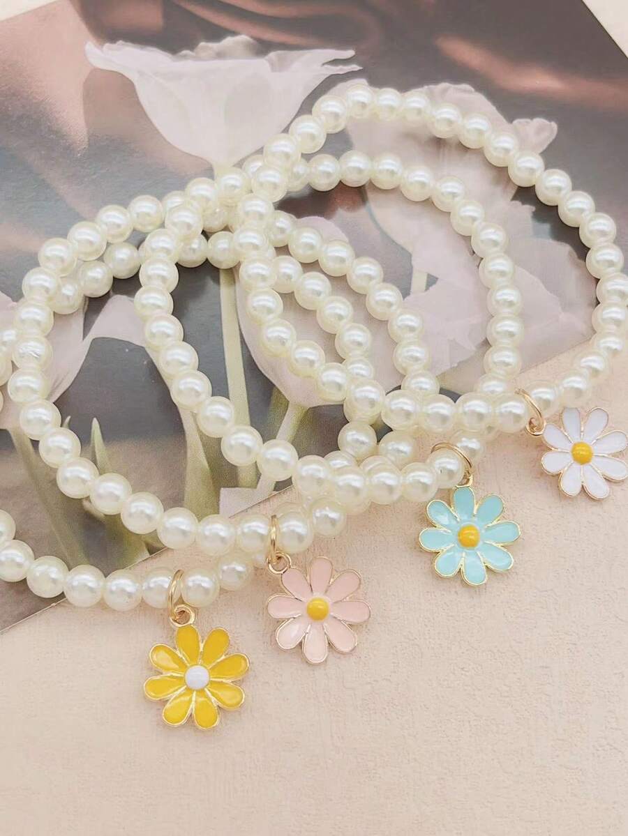 طقم إكسسوارات بنات لطيف – 4 قطع لؤلؤ وفراشة وديزي ودوار الشمس