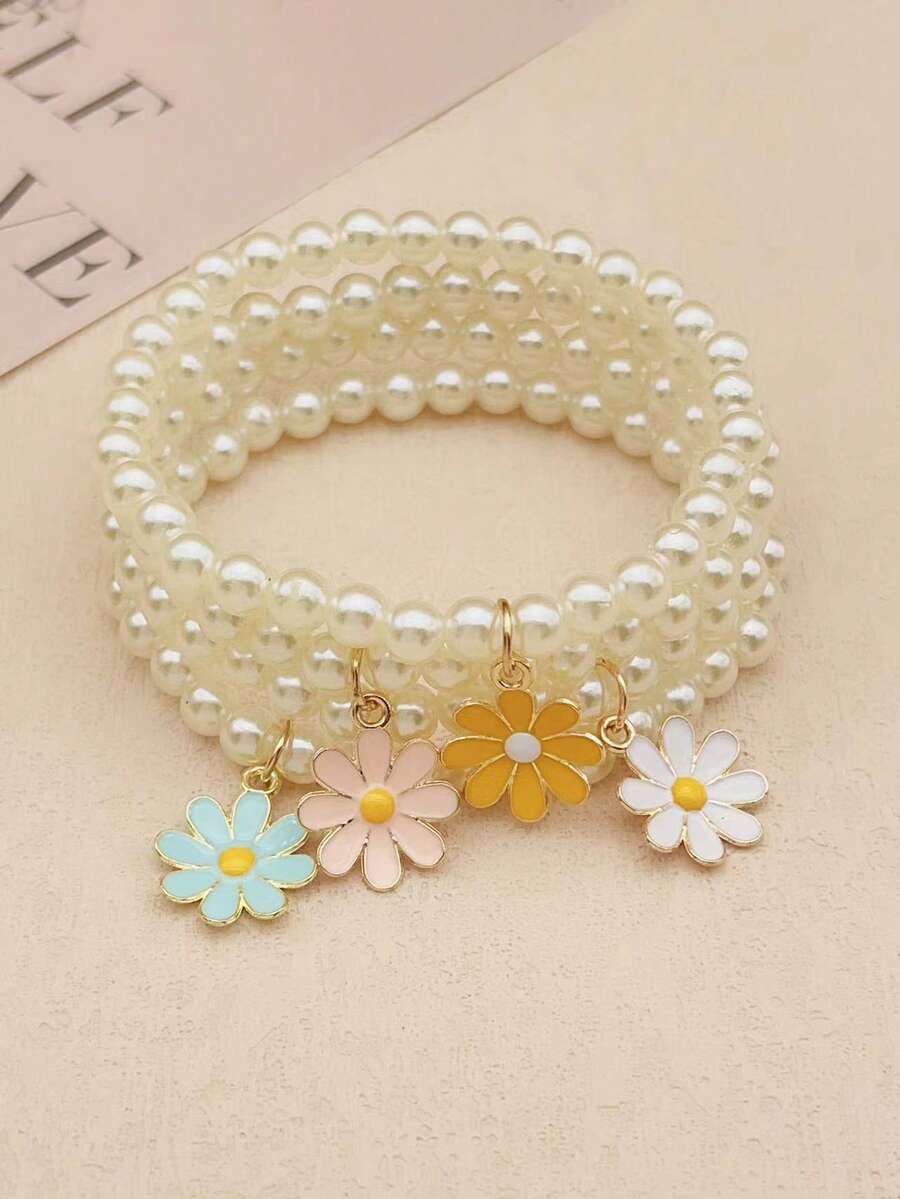 طقم إكسسوارات بنات لطيف – 4 قطع لؤلؤ وفراشة وديزي ودوار الشمس