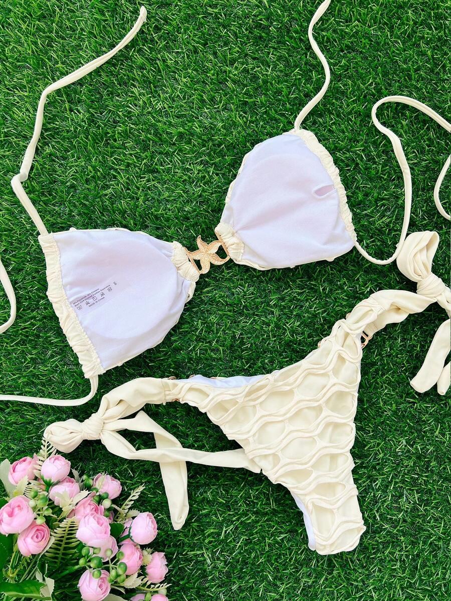 طقم نسائي صيفي 2 قطعة من Elenzga – توب هالتر بدون ظهر وبكيني جانبي مزين