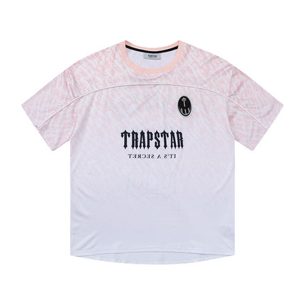 تي شيرت نسائي من Trapstar مطبوع عليها رسومات جرافيكية