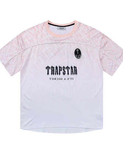 تي شيرت نسائي من Trapstar مطبوع عليها رسومات جرافيكية