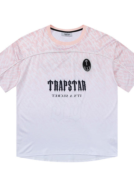 تي شيرت نسائي من Trapstar مطبوع عليها رسومات جرافيكية
