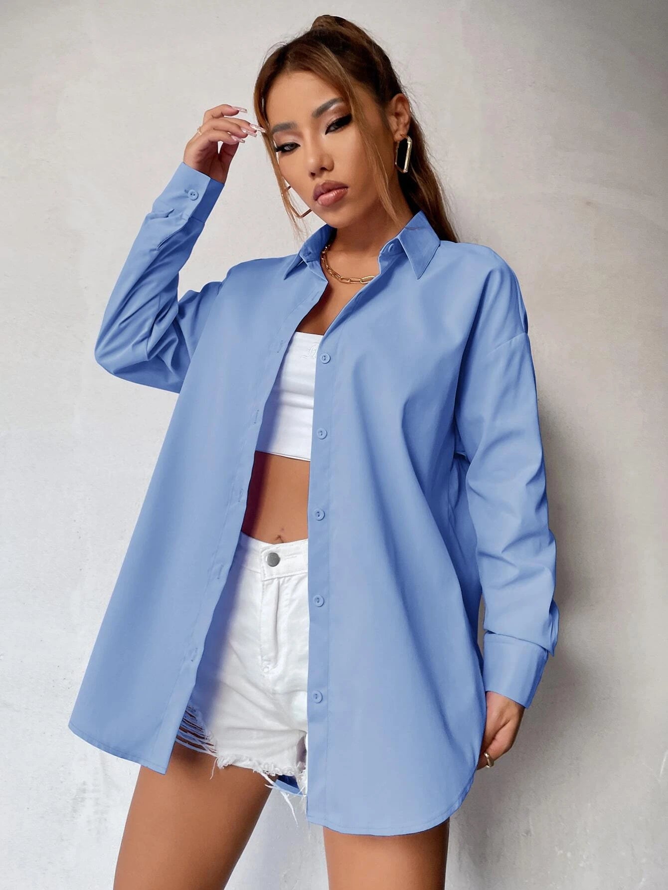 قميص فضفاض بلون سادة وأكتاف منسدلة من إيزي وير – شي إن
